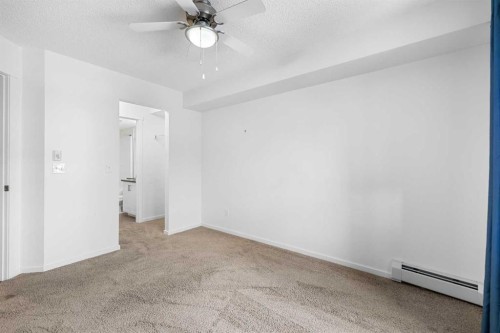1211-279 Copperpond Common Se, Calgary, AB - Indoor Photo Showing Other Room