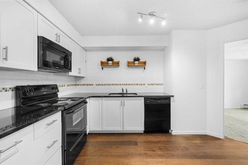 1211-279 Copperpond Common Se, Calgary, AB - Indoor Photo Showing Kitchen