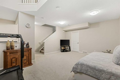 143 Masters Link Se, Calgary, AB - Indoor Photo Showing Bedroom