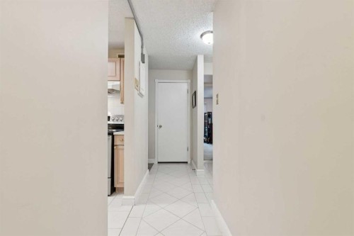 1107-201 Brae Glen Sw, Calgary, AB - Indoor Photo Showing Other Room