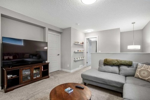 131 Seton Heath Se, Calgary, AB - Indoor Photo Showing Living Room