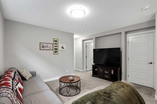 131 Seton Heath Se, Calgary, AB - Indoor Photo Showing Living Room