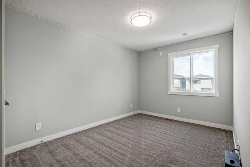 131 Seton Heath Se, Calgary, AB - Indoor Photo Showing Other Room