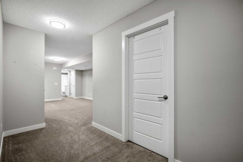 131 Seton Heath Se, Calgary, AB - Indoor Photo Showing Other Room