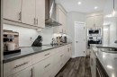131 Seton Heath Se, Calgary, AB  - Indoor Photo Showing Kitchen With Upgraded Kitchen 