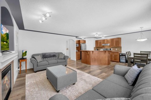 105 Covemeadow Bay Ne, Calgary, AB - Indoor Photo Showing Living Room With Fireplace