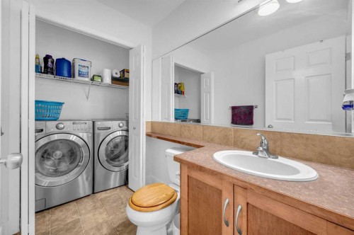105 Covemeadow Bay Ne, Calgary, AB - Indoor Photo Showing Laundry Room