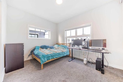 69 Les Jardins Park Se, Calgary, AB - Indoor Photo Showing Bedroom