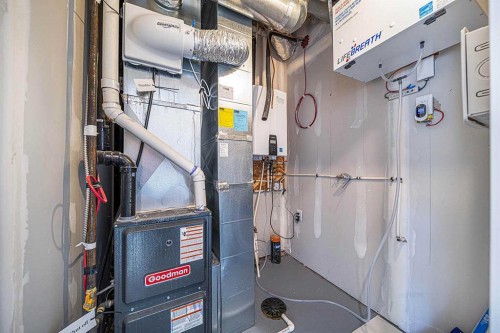 69 Les Jardins Park Se, Calgary, AB - Indoor Photo Showing Basement