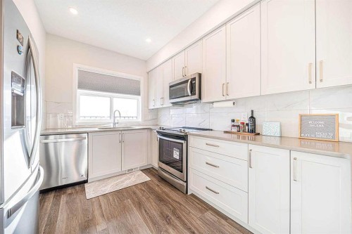 69 Les Jardins Park Se, Calgary, AB - Indoor Photo Showing Kitchen With Stainless Steel Kitchen With Upgraded Kitchen