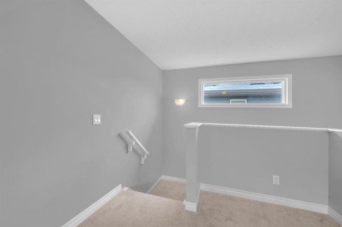 402 Hillcrest Circle Sw, Airdrie, AB - Indoor Photo Showing Other Room
