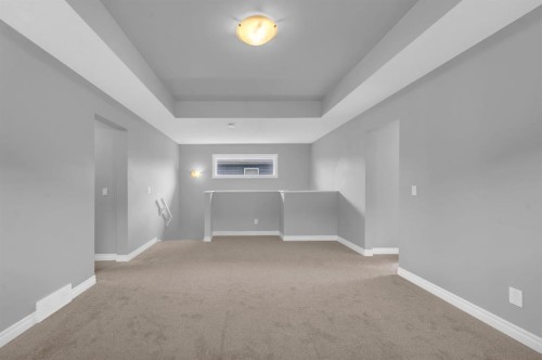 402 Hillcrest Circle Sw, Airdrie, AB - Indoor Photo Showing Other Room