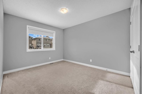 402 Hillcrest Circle Sw, Airdrie, AB - Indoor Photo Showing Other Room