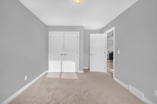 402 Hillcrest Circle Sw, Airdrie, AB - Indoor Photo Showing Other Room