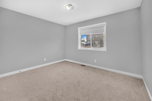 402 Hillcrest Circle Sw, Airdrie, AB - Indoor Photo Showing Other Room
