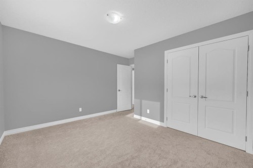 402 Hillcrest Circle Sw, Airdrie, AB - Indoor Photo Showing Other Room