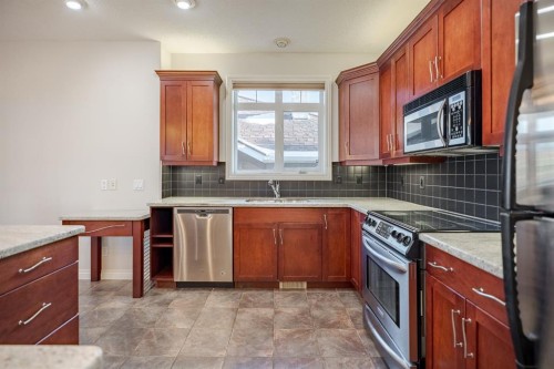 14 Discovery Woods Villas Sw, Calgary, AB - Indoor Photo Showing Kitchen