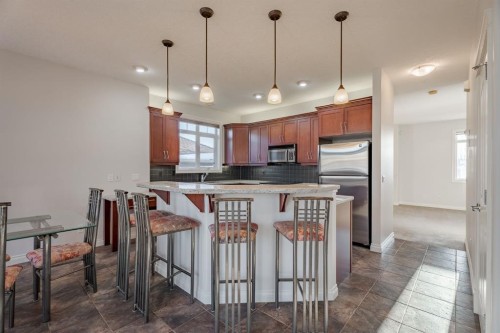 14 Discovery Woods Villas Sw, Calgary, AB - Indoor Photo Showing Other Room