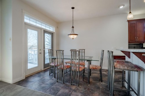 14 Discovery Woods Villas Sw, Calgary, AB - Indoor Photo Showing Dining Room