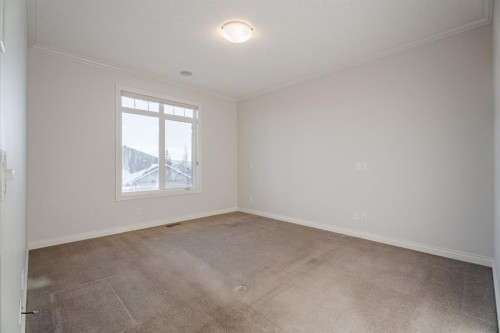 14 Discovery Woods Villas Sw, Calgary, AB - Indoor Photo Showing Other Room