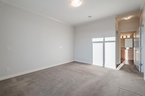 14 Discovery Woods Villas Sw, Calgary, AB - Indoor Photo Showing Other Room