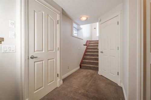 14 Discovery Woods Villas Sw, Calgary, AB - Indoor Photo Showing Other Room