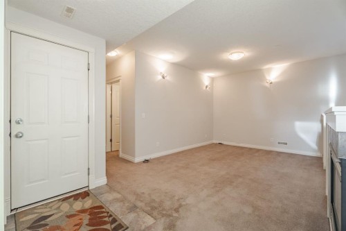 14 Discovery Woods Villas Sw, Calgary, AB - Indoor Photo Showing Other Room