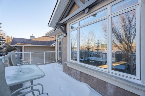 14 Discovery Woods Villas Sw, Calgary, AB - Outdoor With Deck Patio Veranda With Exterior
