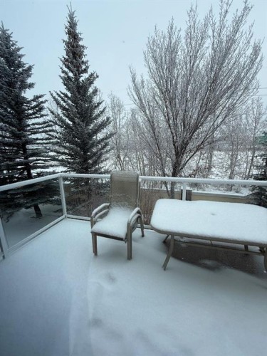 14 Discovery Woods Villas Sw, Calgary, AB - Outdoor