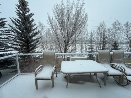 14 Discovery Woods Villas Sw, Calgary, AB - Outdoor