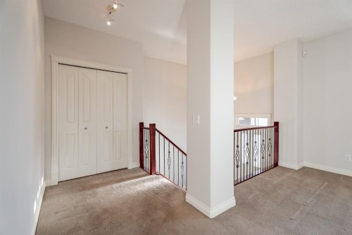 14 Discovery Woods Villas Sw, Calgary, AB - Indoor Photo Showing Other Room