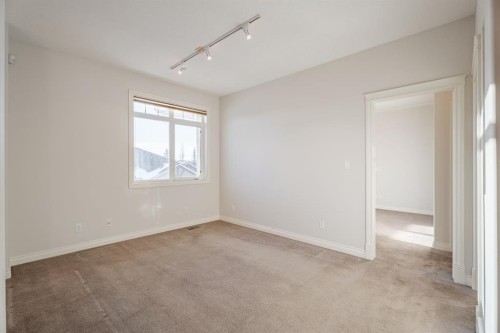 14 Discovery Woods Villas Sw, Calgary, AB - Indoor Photo Showing Other Room