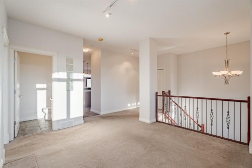 14 Discovery Woods Villas Sw, Calgary, AB - Indoor Photo Showing Other Room