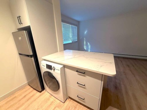 1821 17 Street Sw, Calgary, AB - Indoor Photo Showing Laundry Room