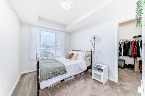 2401-42 Cranbrook Gardens Se, Calgary, AB - Indoor Photo Showing Bedroom