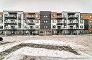 2401-42 Cranbrook Gardens Se, Calgary, AB  - Outdoor With Balcony With Facade 