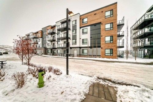2401-42 Cranbrook Gardens Se, Calgary, AB - Outdoor With Balcony With Facade