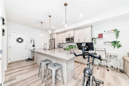 2401-42 Cranbrook Gardens Se, Calgary, AB - Indoor Photo Showing Kitchen With Upgraded Kitchen