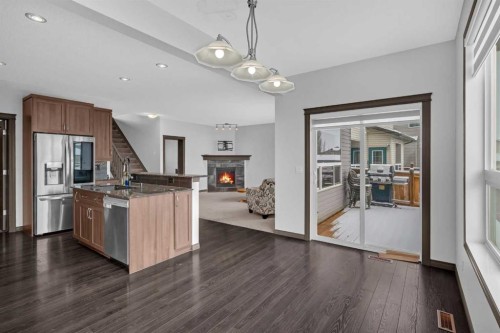 1121 Kingston Crescent Se, Airdrie, AB - Indoor With Fireplace