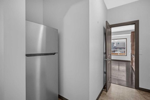 1121 Kingston Crescent Se, Airdrie, AB - Indoor Photo Showing Other Room