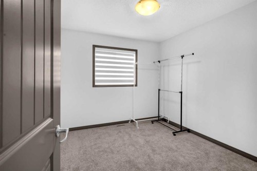 1121 Kingston Crescent Se, Airdrie, AB - Indoor Photo Showing Other Room