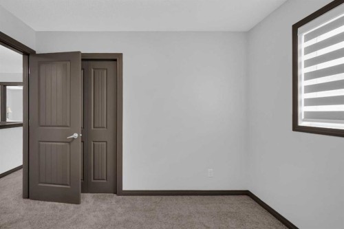 1121 Kingston Crescent Se, Airdrie, AB - Indoor Photo Showing Other Room