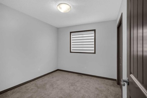 1121 Kingston Crescent Se, Airdrie, AB - Indoor Photo Showing Other Room