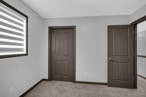 1121 Kingston Crescent Se, Airdrie, AB - Indoor Photo Showing Other Room