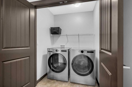 1121 Kingston Crescent Se, Airdrie, AB - Indoor Photo Showing Laundry Room