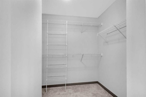1121 Kingston Crescent Se, Airdrie, AB - Indoor With Storage