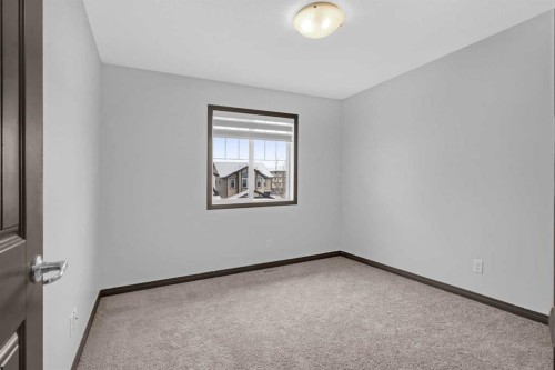 1121 Kingston Crescent Se, Airdrie, AB - Indoor Photo Showing Other Room