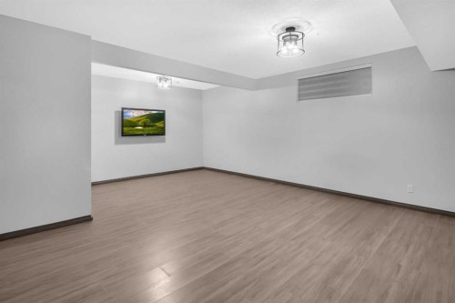 1121 Kingston Crescent Se, Airdrie, AB - Indoor Photo Showing Other Room
