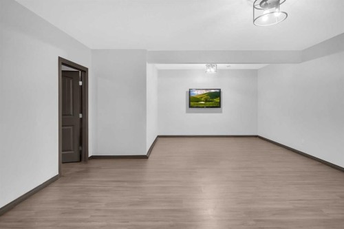 1121 Kingston Crescent Se, Airdrie, AB - Indoor Photo Showing Other Room