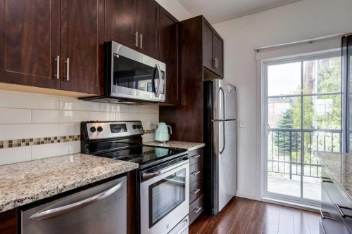 215 Copperpond Common Se, Calgary, AB - Indoor Photo Showing Kitchen With Stainless Steel Kitchen